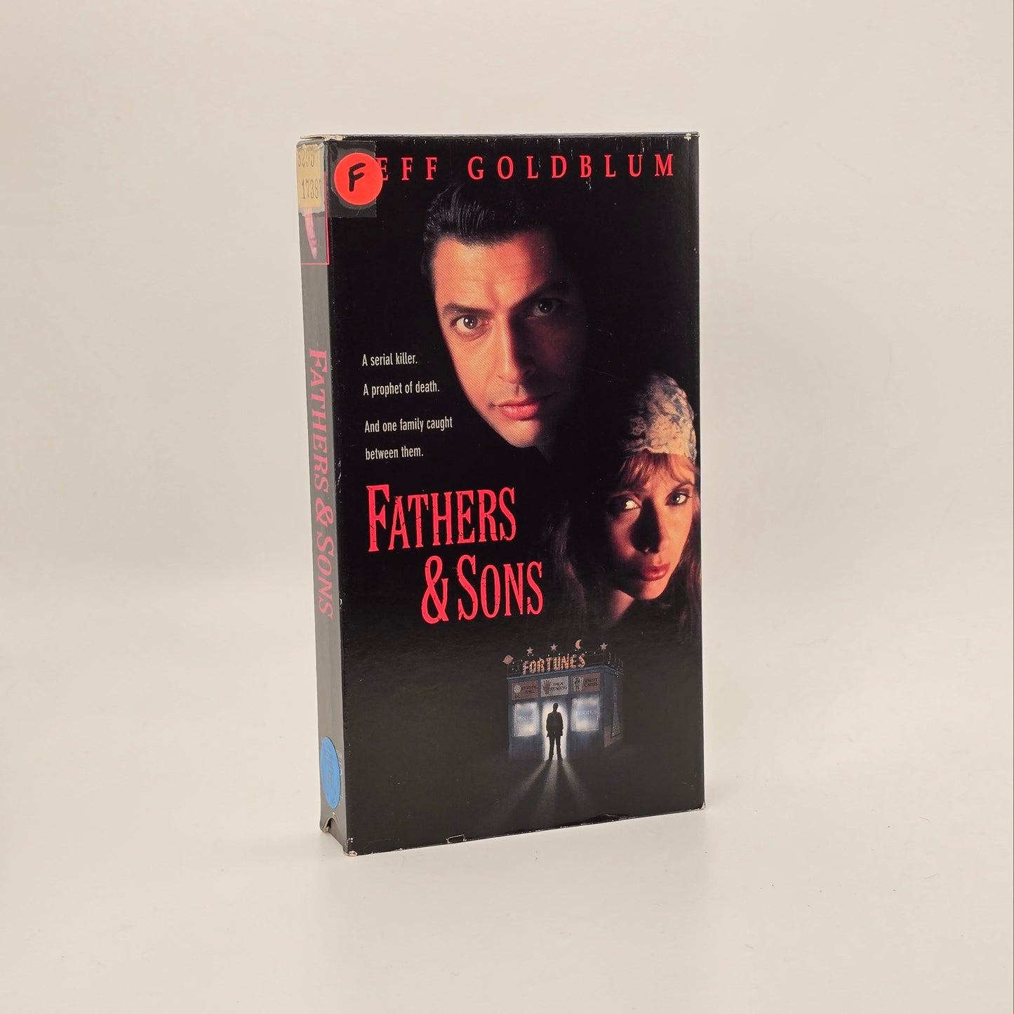 VHS tape cover of 'Fathers & Sons' with a man and woman on the cover against a dark background.