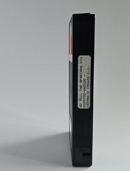Go Tell the Spartans cassette spine with missing sticker.